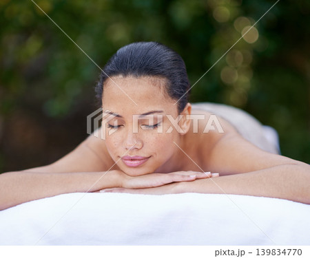 Spa, woman and relax on massage bed with smile for wellness, zen and beauty treatment for body care. Person, sleeping and stress relief at resort, salon table and peaceful on holiday or vacation Spa, woman and relax on massage bed with smile for wellness, zen and beauty treatment for body care. Person, sleeping and stress relief at resort, salon table and peaceful on holiday or vacation 139834770