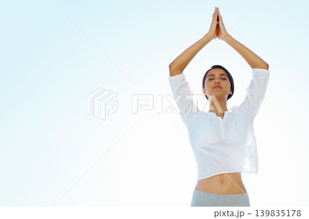 Woman, meditation and zen for spiritual wellness, awareness or outdoor yoga with blue sky background. Calm female person or yogi meditating for inner peace, breathing or health on mockup space 139835178