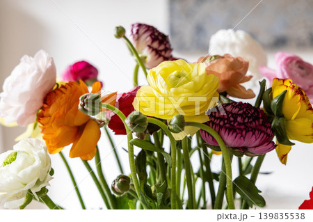 Bright Ranunculus Bouquet In Modern Interior. Bright Ranunculus Bouquet In Modern Interior. 139835538