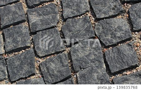 Method of laying rough paving stones without cement mortar 139835768