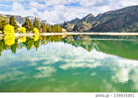 Man kayaking on the reservoir in the Sant Llorenc de Montgai Natural Park, Noguera region, Lleida, Catalonia. Nature, water sports 139835801