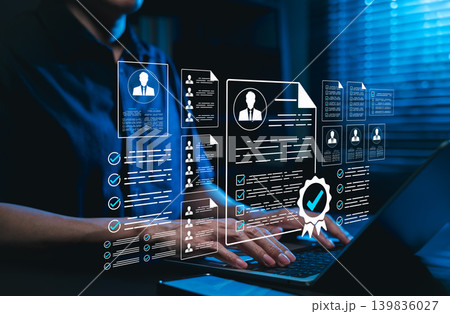 Human resources management and recruitment concept. HR manager evaluating online resume profiles and candidate curriculum vitae data on laptop for job position interview selection, recruitment screen, Human resources management and recruitment concept. HR manager evaluating online resume profiles and candidate curriculum vitae data on laptop for job position interview selection, recruitment screen, 139836027