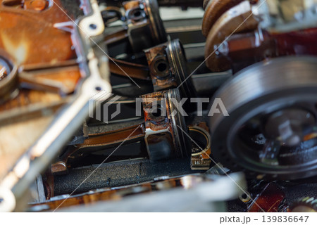 Closeup of engine pistons internal motor components showing automotive repair maintenance mechanical engineering details Closeup of engine pistons internal motor components showing automotive repair maintenance mechanical engineering details 139836647