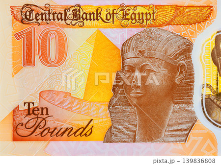 Egyptian Ten LE EGP pound polymer banknote with ancient Pharaoh Ramses II Giza pyramids. Egyptian Ten LE EGP pound polymer banknote with ancient Pharaoh Ramses II Giza pyramids. 139836808