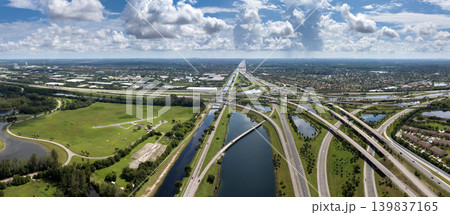 USA car urban transportation infrastructure. American highway junction with fast driving vehicles in Miami, Florida 139837165