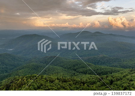 Bright sunrise in North Carolina Appalachian mountains in summer season. Summertime landscape of beautiful nature Bright sunrise in North Carolina Appalachian mountains in summer season. Summertime landscape of beautiful nature 139837172