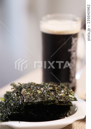 Nori Seaweed Slices and Bottle Close-up 139840962