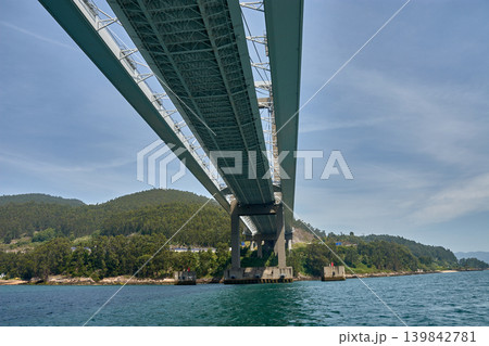 Low-angle perspective of the concrete columns and beams of the Rande Bridge in the province of Vigo Low-angle perspective of the concrete columns and beams of the Rande Bridge in the province of Vigo 139842781