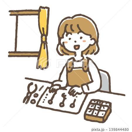 ハンドメイド作品を制作している女性のイラスト。 ハンドメイド作品を制作している女性のイラスト。 139844480