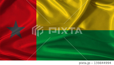 National flag of Guinea Bisau with cloth texture. Guinea Bisau flag with realistic texture background 139844994