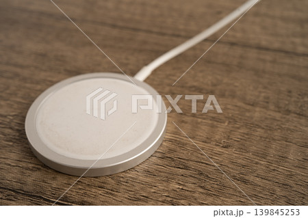 Wireless charger, magnetic charging modern equipment of mobile phone. 139845253