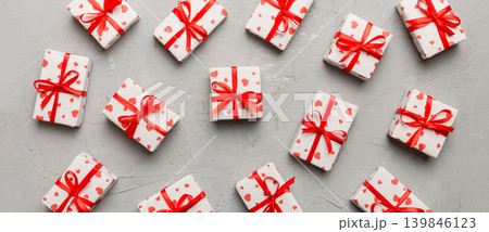 Valentine day composition Background: red gift box with bow and heart. Christmas present. View from above. Holday greeting card 139846123