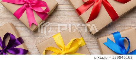 Collection of Holiday present boxes on a colored background. top view close up 139846162