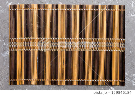 Top view of brown tablecloth for food on cement background. Empty space for your design Top view of brown tablecloth for food on cement background. Empty space for your design 139846184