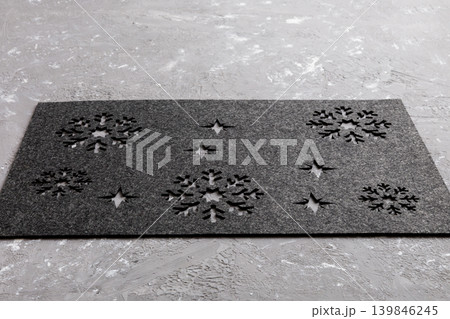Perspective view of grey tablecloth for food on cement background. Empty space for your design 139846245