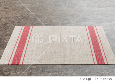 Perspective view of red tablecloth for food on cement background. Empty space for your design 139846259