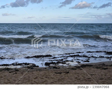 Empty Ocean Beach With Stormy Waves Background Empty Ocean Beach With Stormy Waves Background 139847068