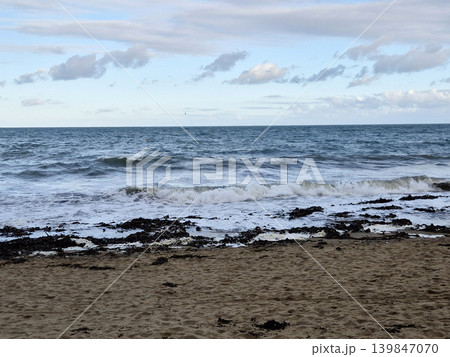 Empty Ocean Beach With Stormy Waves Background Empty Ocean Beach With Stormy Waves Background 139847070