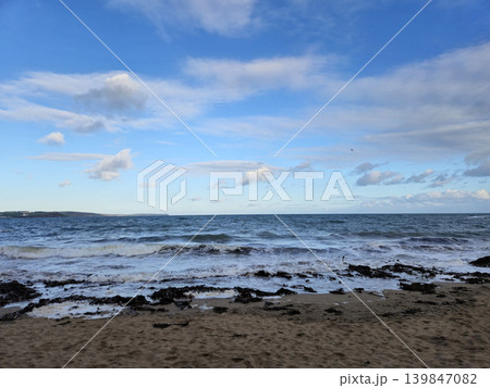 Empty Ocean Beach With Stormy Waves Background Empty Ocean Beach With Stormy Waves Background 139847082