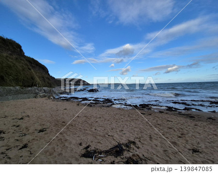 Empty Ocean Beach With Stormy Waves Background 139847085