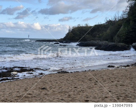 Empty Ocean Beach With Stormy Waves Background 139847093