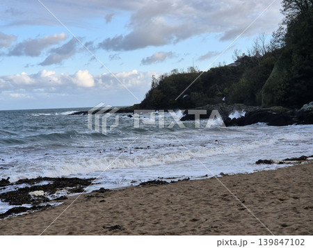 Empty Ocean Beach With Stormy Waves Background 139847102