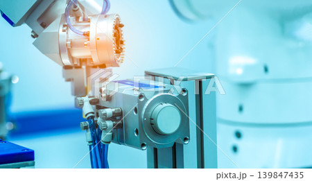 Industrial robotic automation system with pneumatic actuator and precision motor. Manufacturing process for high efficiency production and advanced engineering technology. Industrial technology. Industrial robotic automation system with pneumatic actuator and precision motor. Manufacturing process for high efficiency production and advanced engineering technology. Industrial technology. 139847435