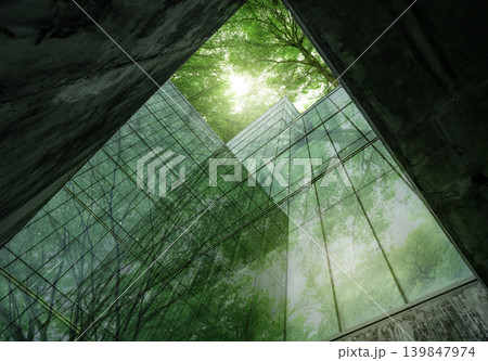 Eco-friendly building in modern city. Sustainable glass office building with trees for reducing carbon dioxide. Office building with green environment. Corporate building reduce CO2. Net zero emission 139847974