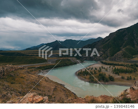 Two rivers Katun and Chuya with clear and muddy waters merge in the Altai mountain range 139848146