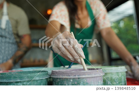 A happy couple makes ceramic plates in a workshop A happy couple makes ceramic plates in a workshop 139848510