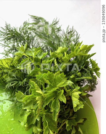 Fresh Parsley And Dill Bundle On Plate Fresh Parsley And Dill Bundle On Plate 139849096