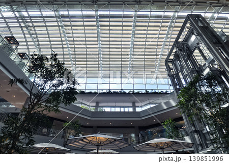 An expansive shopping environment characterized by openair terraces and sleek architectural design An expansive shopping environment characterized by openair terraces and sleek architectural design 139851996