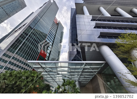 Innovative business exterior emphasizing environmentally friendly resources and abundant greenery Innovative business exterior emphasizing environmentally friendly resources and abundant greenery 139852702