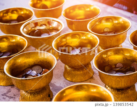 Symbols of Buddhism. South-Eastern Asia. Details of buddhist temple in Thailand. Symbols of Buddhism. South-Eastern Asia. Details of buddhist temple in Thailand. 139853542
