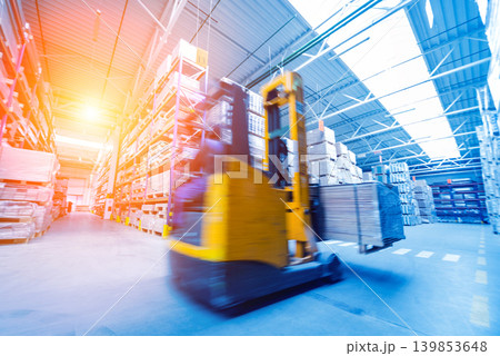 Forklift loader in storage warehouse ship yard. Distribution products. Forklift loader in storage warehouse ship yard. Distribution products. 139853648