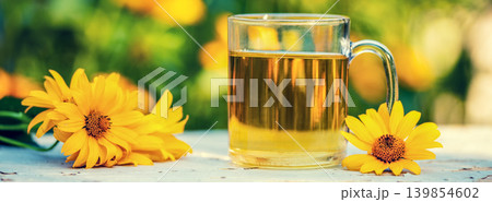 A cup of herbal tee in the garden 139854602