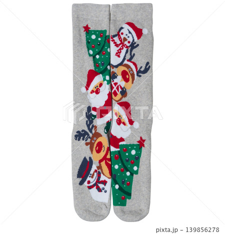 Pair of long warm Christmas socks with Santa Claus and christmas trees pattern, flat lay isolated on white background Pair of long warm Christmas socks with Santa Claus and christmas trees pattern, flat lay isolated on white background 139856278