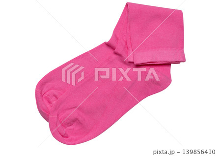 A pair of thin pink cotton socks laid out on a flat surface, isolated on white background. 139856410