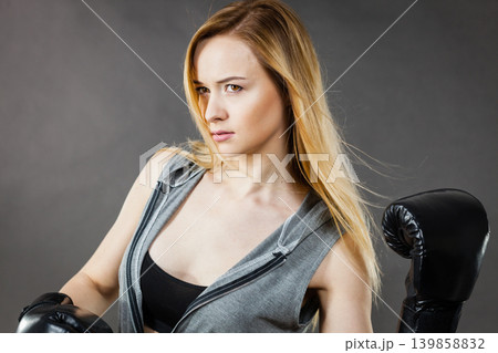 Boxer girl exercise with boxing gloves. Boxer girl exercise with boxing gloves. 139858832