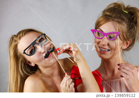 Two women with carnival masks 139859112