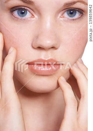 Portrait, woman and skincare with confidence in studio, skin and hands with natural wellness for selfcare and beauty. Cosmetics, care and routine for hygiene with nourish, treatment and glow Portrait, woman and skincare with confidence in studio, skin and hands with natural wellness for selfcare and beauty. Cosmetics, care and routine for hygiene with nourish, treatment and glow 139859642