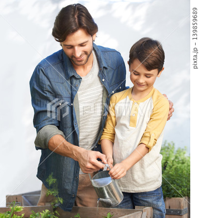 Dad, boy and greenhouse with water for plants, vegetation and agriculture for family business. Father, son and teach in planthouse to grow organic vegetables to sell, sustainability and gardening Dad, boy and greenhouse with water for plants, vegetation and agriculture for family business. Father, son and teach in planthouse to grow organic vegetables to sell, sustainability and gardening 139859689
