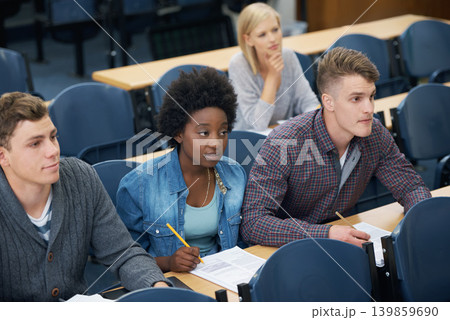 College, writing and students learning with notes in class, auditorium or lecture hall for education. University, classroom or people in campus for knowledge or studying a course in academy or school College, writing and students learning with notes in class, auditorium or lecture hall for education. University, classroom or people in campus for knowledge or studying a course in academy or school 139859690