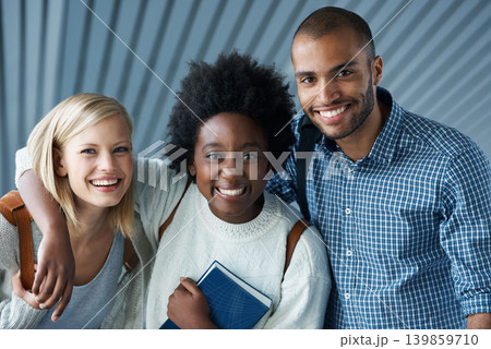 Friends, hug and happy portrait in university with diversity of students together to study in education. College, people and smile on campus with inclusion in school with collaboration or support Friends, hug and happy portrait in university with diversity of students together to study in education. College, people and smile on campus with inclusion in school with collaboration or support 139859710