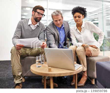 Business people, laptop and teamwork with documents for planning, brainstorming or strategy at office. Businessman, CEO or executive showing employees project on computer for research and development Business people, laptop and teamwork with documents for planning, brainstorming or strategy at office. Businessman, CEO or executive showing employees project on computer for research and development 139859786