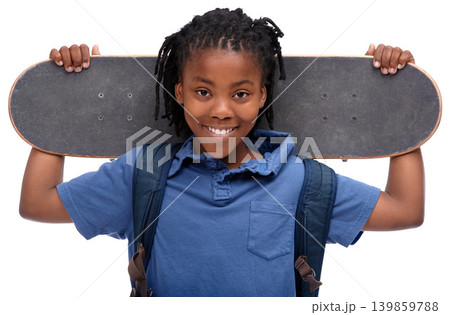 Portrait, smile and african boy skater in studio isolated on white background for sports or leisure. Kids, happy or training and face of confident young kid with board for skating or recreation 139859788