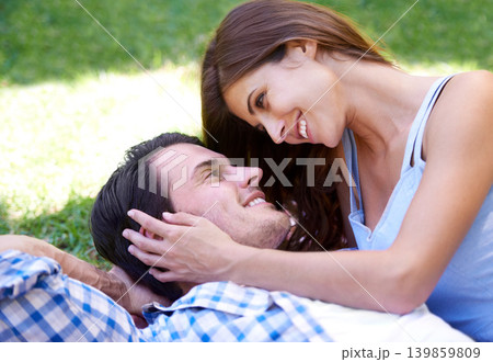 Man, woman and relax in park for holiday in summer bonding or weekend, happiness or outdoor. Happy couple, smile and embrace on blanket on grass lawn for dating connection or rest, love or London Man, woman and relax in park for holiday in summer bonding or weekend, happiness or outdoor. Happy couple, smile and embrace on blanket on grass lawn for dating connection or rest, love or London 139859809