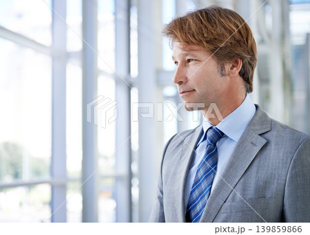 Thinking, ideas or confident businessman by window for development project mission or problem solving. Dream, vision or male entrepreneur with plan for future goal, inspiration or solution by glass Thinking, ideas or confident businessman by window for development project mission or problem solving. Dream, vision or male entrepreneur with plan for future goal, inspiration or solution by glass 139859866