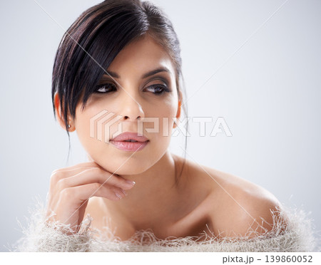 Woman, makeup and beauty or glow in studio, facial treatment and cosmetic shine on white background. Female person, serious and eyeliner for attitude, confident and pride for skincare or dermatology 139860052