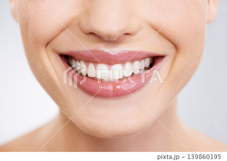 Beauty, mouth and teeth with woman closeup in studio on gray background for dental care or oral hygiene. Skincare, smile and orthodontics with happy young model at spa or dentist for natural wellness 139860195